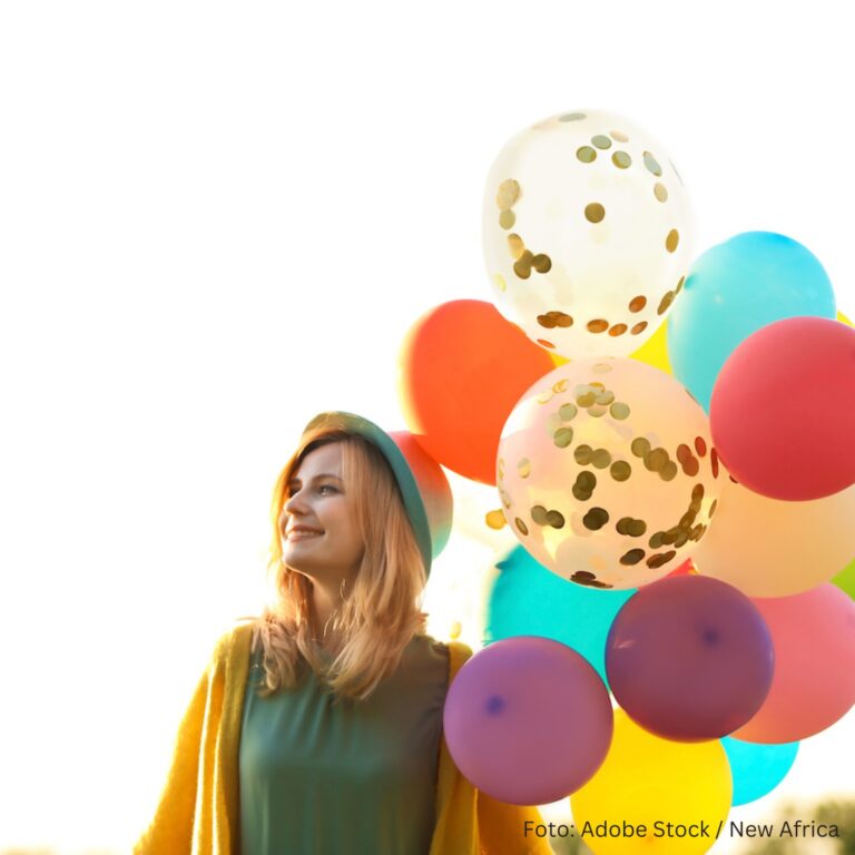 Vermögen: Frau mit Luftballons
