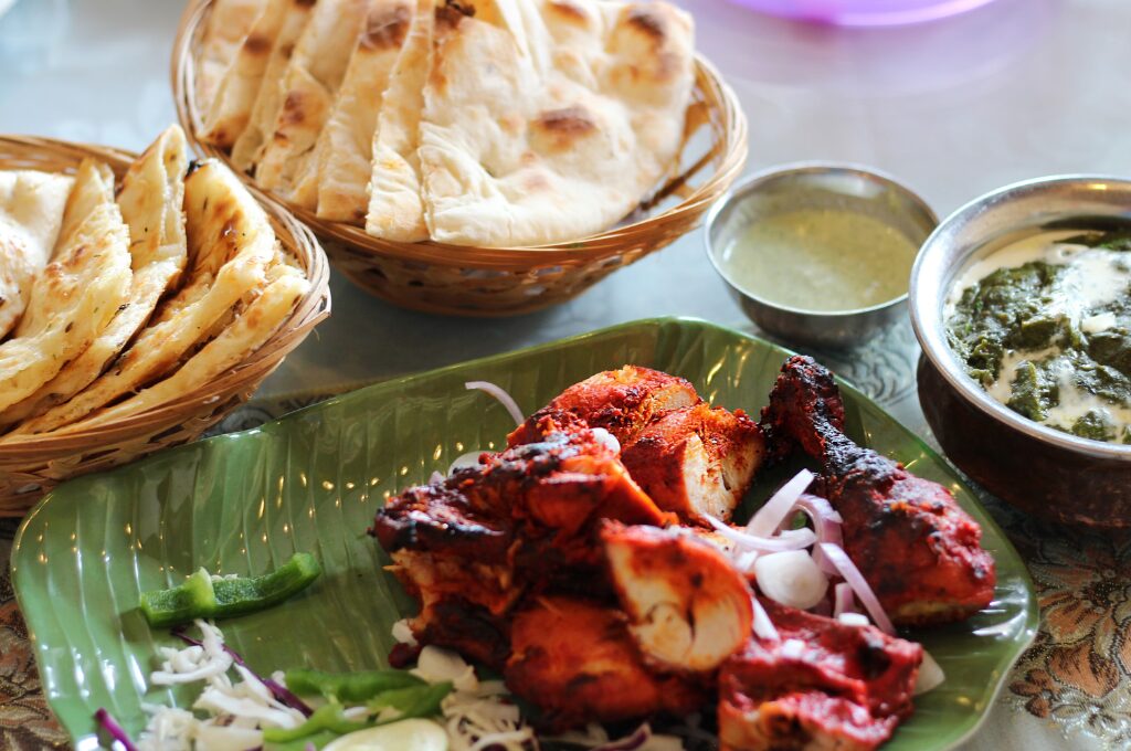 Indische Restaurants in Hamburg, indisches Gericht mit Naan